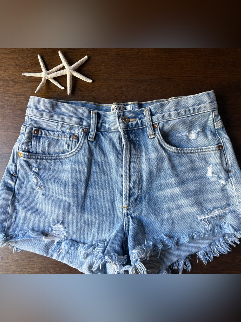 Agolde Light Wash Distressed Denim Cutoff Shorts